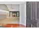 View of a living room with a fireplace and a ceiling fan, bathed in natural light at 85 Parks Pl, Sharpsburg, GA 30277