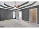 Large main bedroom featuring a ceiling fan and doorway to the main bathroom at 85 Parks Pl, Sharpsburg, GA 30277