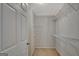 Walk-in closet with multiple shelves for organization at 85 Parks Pl, Sharpsburg, GA 30277