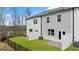 Newly built townhome exterior with backyard and lawn at 310 Sound Circle, Stockbridge, GA 30281