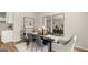 Open dining room with decorative mirrors, modern furniture, and elegant accessories at 310 Sound Circle, Stockbridge, GA 30281