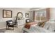 Beautiful main bedroom with carpet, decor, and a large window offering scenic views at 310 Sound Circle, Stockbridge, GA 30281