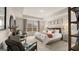 Spacious main bedroom with tray ceilings, carpeted floors, and large windows at 310 Sound Circle, Stockbridge, GA 30281