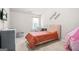 Cozy bedroom decorated with a toy tent, and a stylish changing table at 361 Traditions Ln, Hampton, GA 30228