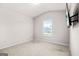Bright bedroom with natural light and wall-mounted television at 361 Traditions Ln, Hampton, GA 30228