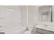 Clean bathroom features a shower-tub combo, white toilet, and single sink vanity at 314 Sound Cir, Stockbridge, GA 30281
