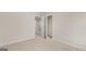 Unfurnished bedroom shows doorway entrance, plush carpet, and neutral paint at 314 Sound Cir, Stockbridge, GA 30281