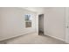 Unfurnished bedroom shows walk-in closet, plush carpet, and natural light at 314 Sound Cir, Stockbridge, GA 30281
