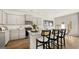 Stylish kitchen featuring granite countertops, stainless steel appliances and counter seating at 314 Sound Cir, Stockbridge, GA 30281