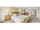 Well-lit main bedroom with a comfortable queen-sized bed, stylish furnishings, and neutral decor at 314 Sound Cir, Stockbridge, GA 30281