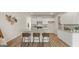Stylish kitchen with granite counters, island with seating, and stainless steel appliances at 318 Sound Circle, Stockbridge, GA 30281