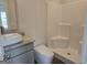 Bathroom featuring granite counter tops and a standing shower at 1676 Fuma Leaf Way # 305, Mcdonough, GA 30253