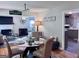 Inviting dining room with an elegant table and chairs, seamlessly connected to the cozy living space at 107 Woodhaven Dr, Stockbridge, GA 30281