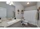 The bathroom has a single vanity, granite counters, a mirror, and a shower/tub combination at 433 Wilson Dr, Mcdonough, GA 30252