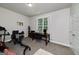 Multi-purpose bedroom is currently being used as a workout room/office at 433 Wilson Dr, Mcdonough, GA 30252
