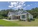 Attractive two-story home with a mix of brick and siding, complemented by a lush green lawn at 433 Wilson Dr, Mcdonough, GA 30252