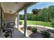 Inviting porch with hanging flower baskets and comfortable seating, creating a relaxing outdoor space at 433 Wilson Dr, Mcdonough, GA 30252