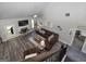 Spacious living room with fireplace, vaulted ceilings, and hardwood-style floors at 433 Wilson Dr, Mcdonough, GA 30252