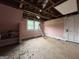 Room needing remodeling, awaiting transformation with its original hardwood floors and natural light at 435 Jackson St, Locust Grove, GA 30248