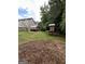 Expansive backyard with mature trees, offering ample space for outdoor activities and relaxation at 639 Sheffield Ct, Villa Rica, GA 30180
