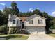 Charming two-story home featuring a two-car garage, a well-maintained yard, and a classic design at 639 Sheffield Ct, Villa Rica, GA 30180