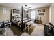 Cozy bedroom featuring a four-poster bed, soft carpeting, and great natural light at 639 Sheffield Ct, Villa Rica, GA 30180