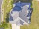 Aerial view of a home showcasing the roof and surrounding yard at 100 Harmony Ct, Dallas, GA 30157