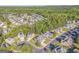 Scenic aerial view of a well-planned neighborhood with mature trees and manicured lawns at 100 Harmony Ct, Dallas, GA 30157