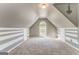 Large bonus room featuring carpet flooring, wainscoting, large window, and overhead lighting at 100 Harmony Ct, Dallas, GA 30157