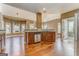 Open concept kitchen with stainless steel appliances and hardwood floors at 100 Harmony Ct, Dallas, GA 30157
