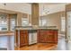 Kitchen featuring stylish cabinets, black granite countertops, stainless steel appliances, and hardwood floors at 100 Harmony Ct, Dallas, GA 30157