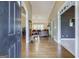 Inviting foyer with hardwood floors leading to the spacious living area at 1621 White Oak Cv, Loganville, GA 30052