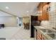 Kitchen and dining area showcasing stainless steel appliances and open layout at 1621 White Oak Cv, Loganville, GA 30052