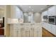 Bright, open kitchen with granite counters, stainless steel appliances, and white cabinets at 1621 White Oak Cv, Loganville, GA 30052