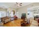 Bright and open living room featuring hardwood floors and open floor plan at 1621 White Oak Cv, Loganville, GA 30052