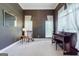 Cozy living room with neutral carpet, filled with lots of natural light at 1621 White Oak Cv, Loganville, GA 30052