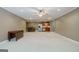 Open living room layout with kitchen and dining area, providing ample space for relaxation and entertainment at 1621 White Oak Cv, Loganville, GA 30052