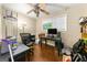 Bedroom with hardwood floors, a ceiling fan, a window, and natural light at 2257 Chestnut Log Loop, Lithia Springs, GA 30122
