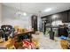 The kitchen features dark cabinets, stainless steel appliances and plenty of counter space for cooking at 2257 Chestnut Log Loop, Lithia Springs, GA 30122