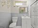 This bathroom features a standard toilet, glass shower, and simple faucet at 1283 Bramble Ne Rd, Atlanta, GA 30329