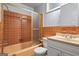 This bathroom has a shower, toilet, and a standard sink with storage at 1283 Bramble Ne Rd, Atlanta, GA 30329