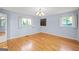 This bedroom features hardwood floors, natural lighting, and a wall-mounted bookshelf at 1283 Bramble Ne Rd, Atlanta, GA 30329