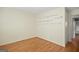 Cozy bedroom with hardwood floors, built in shelves and an entry to the bedroom and closet at 1283 Bramble Ne Rd, Atlanta, GA 30329