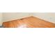 Bedroom featuring hardwood floors, base trim, and electrical outlet at 1283 Bramble Ne Rd, Atlanta, GA 30329