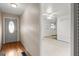 View of the hallway leading into a bedroom featuring a ceiling fan and window at 1283 Bramble Ne Rd, Atlanta, GA 30329