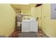 Laundry room features a washer, dryer, and a water heater at 1283 Bramble Ne Rd, Atlanta, GA 30329