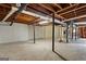Unfinished basement with utilities and concrete floor at 315 Burke Cir, Mcdonough, GA 30253