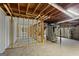 Unfinished basement features utilities and exposed wood at 315 Burke Cir, Mcdonough, GA 30253