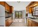Functional kitchen featuring a gas range, double ovens, and ample counter space at 315 Burke Cir, Mcdonough, GA 30253