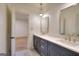 Bathroom with double sinks and gold fixtures at 1947 Clark Dr, Tucker, GA 30084